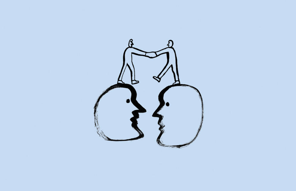 A drawing of two people shaking hands while standing on a pair of giant heads.